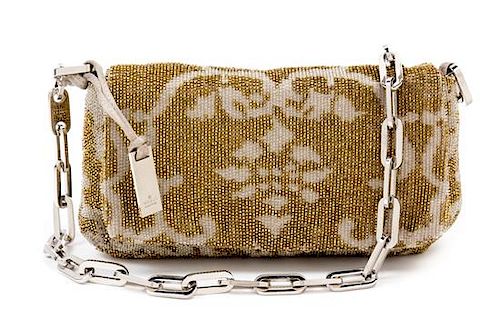 A Gucci Silver and Gold Beaded Bag, 8" x 5" x .5"; Strap drop: 10.