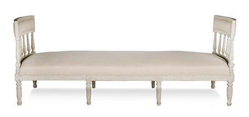 A Gustavian Style Painted Daybed Height 36 x width 93 x depth 29 1/2 inches.