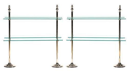 A Pair of Chromed Metal and Glass Etageres Height 40 x width 38 x depth 21 1/2 inches.