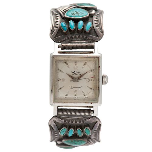 A Navajo Silver and Turquiose Watch Band 