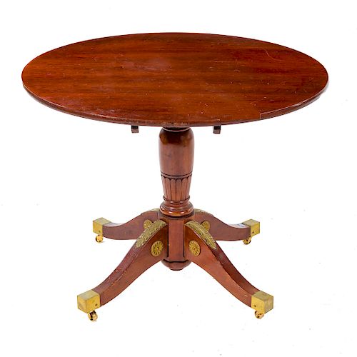 Empire style mahogany tilt-top table