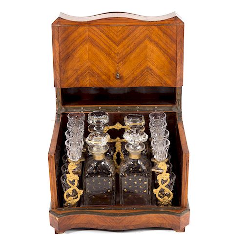 French fruitwood tantalus with glassware