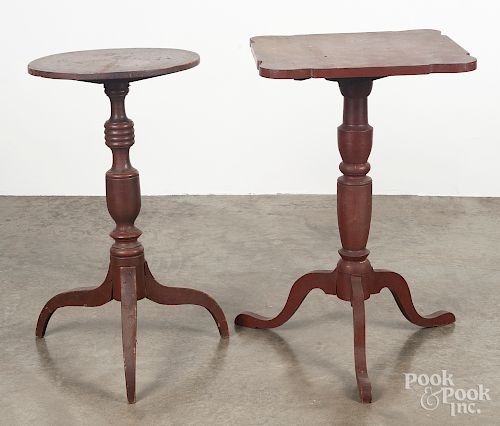 Two red painted candlestands