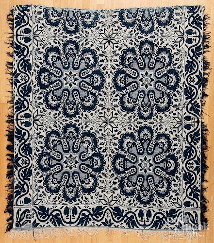 Blue and white jacquard coverlet