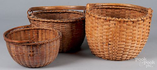 Three swing handled baskets