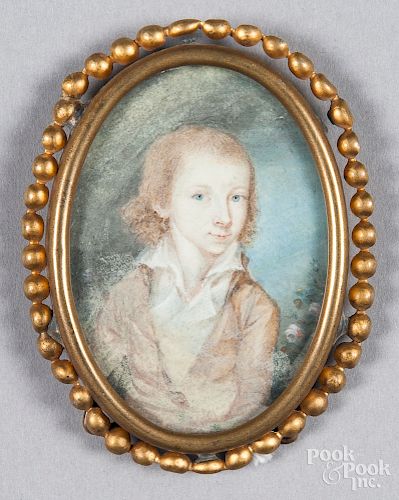Miniature watercolor portrait of a boy