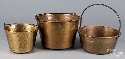 Three brass buckets