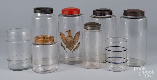 Eight antique glass apothecary jars