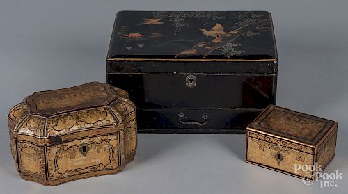 Three Chinese lacquer dresser boxes.