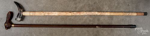 Carved bone cane with horn grip