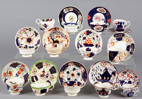 Thirteen Gaudy Welsh cups and saucers