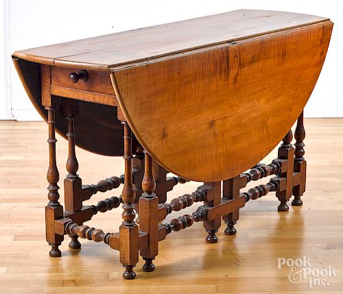William and Mary style tiger maple dining table