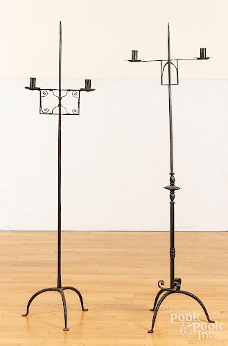 Two wrought iron candlestands