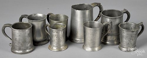 Eight pewter mugs