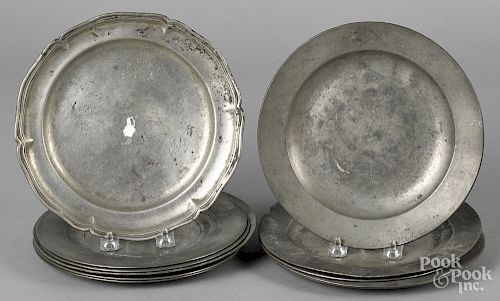Eleven pewter plates