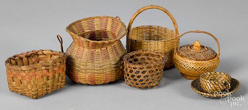 Seven miniature baskets