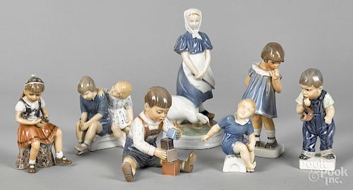 Seven Danish porcelain children figures