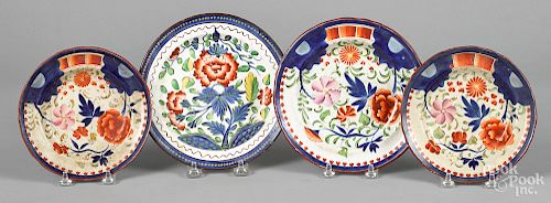 Four Gaudy Dutch porcelain plates and saucers