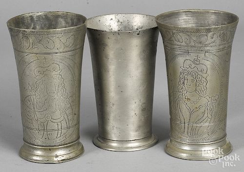 Three English pewter tall beakers