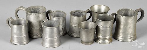 Nine English pewter mugs