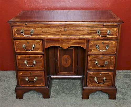 A George III Mahogany Fan Marquetry Inlaid Kneehole Desk, Height 32 x width 39 x depth 19 inches.