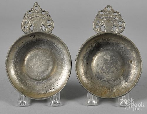 Two crown handle pewter porringers