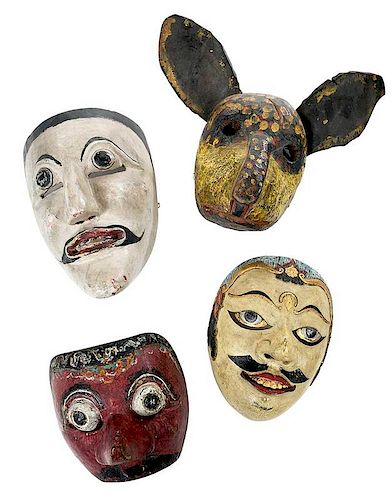Group of Four Wooden Masks