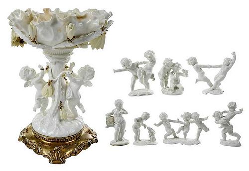 Eight Putti Figural Porcelain Pieces