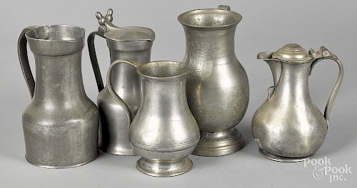 Five Continental pewter tankards and pitchers