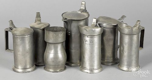 Seven pewter measures
