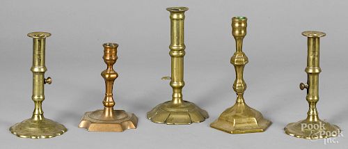 Five Queen Anne brass and bell metal candlesticks