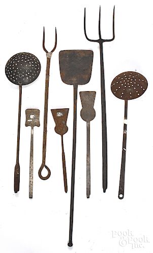 Eight wrought iron stamped utensils