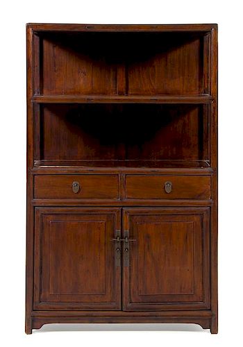 * A Chinese Hongmu Display Cabinet Lianggegui Height 64 x width 39 3/4 x depth 15 1/4 inches.