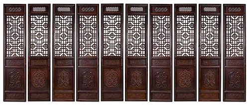* A Large Chinese Zitan Ten-Panel Floor Screen Height 109 x width 25 1/4 x depth 2 1/2 inches.