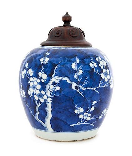 * A Chinese Blue and White Porcelain "Crackled Ice and Prunus" Ginger Jar Height 6 1/4 inches.