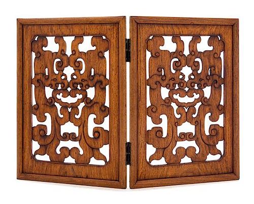 * A Pair of Chinese Huanghuali Rectangular Openworked Panels Each height 15 3/8 x width 10 3/4 x depth 1 inches.