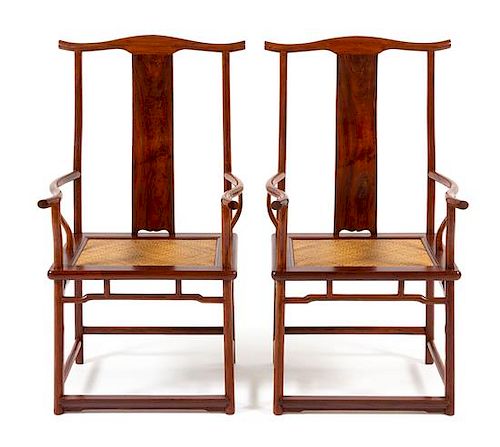 * A Pair of Chinese Huanghuali Official's Hat Armchairs, Sichutouguanmaoyi Each height 44 3/4 x width 24 1/2 x depth 20 inches.