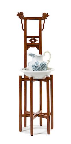 * A Chinese Huanghuali Basin Stand, Mianpenjia Height 52 x width 15 1/4 x depth 13 inches.