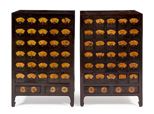 * A Pair of Chinese Huanghuali Inset Elmwood Apothecary Cabinets, Yaogui Each height 43 x width 28 1/4 x depth 19 1/2 inches.