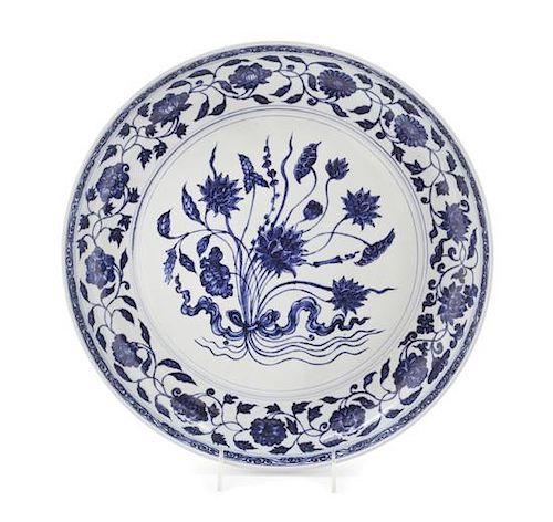 * A Blue and White Porcelain Charger Diameter 13 3/4 inches.
