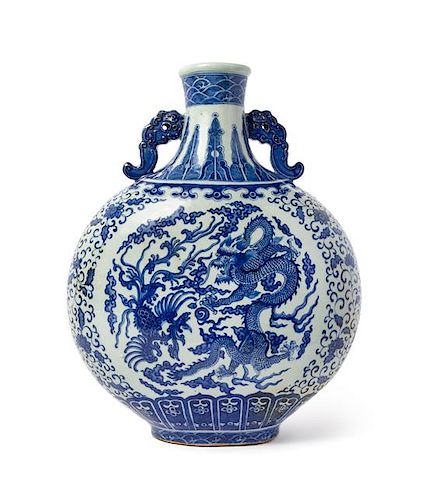 A Large Blue and White Porcelain 'Dragon and Phoenix' Moon Flask Height 18 x width 13 1/2 inches.