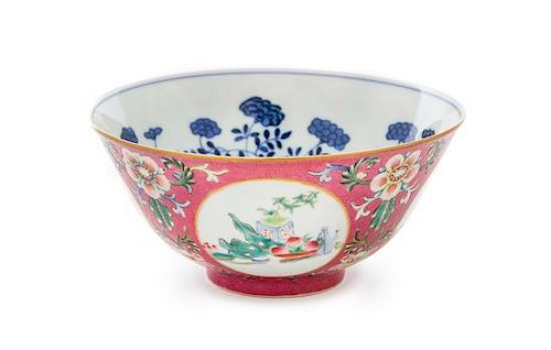 A Ruby-Ground Famille Rose Sgraffiato Porcelain Bowl Diameter 5 7/8 inches.