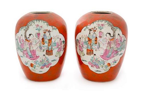 A Pair of Gilt Decorated Coral Red Ground Famille Rose Porcelain Jars Height 11 1/4 inches.