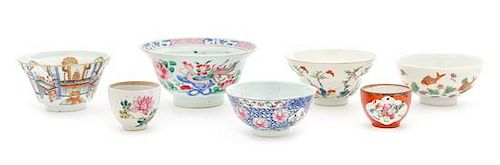 * Seven Famille Rose Porcelain Bowls and Cups Diameter of largest 5 1/2 inches.