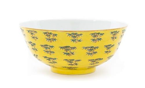 * A Large Yellow Ground Green and Gilt Decorated Porcelain Bowl Diameter 7 3/4 inches.