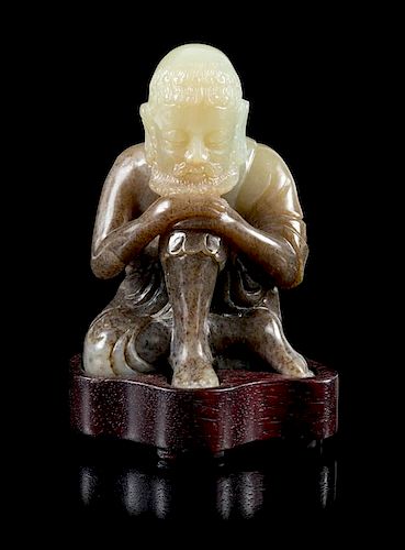 A Black and White Jade Figure of a Damo Height 3 1/2 inches.