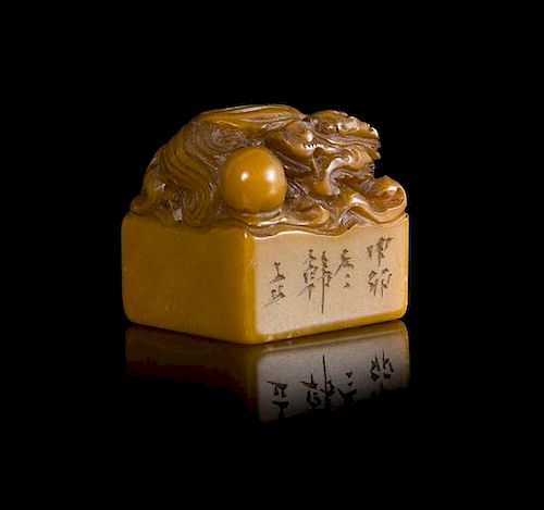 * A Carved Yellow Soapstone Seal Height 1 3/4 inches.