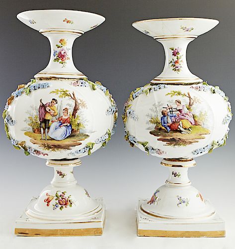 Pair of Meissen Style Baluster Vases, late 19h c., with applied relief floral decoration around a floral reserve on one side and a reserve of lovers i