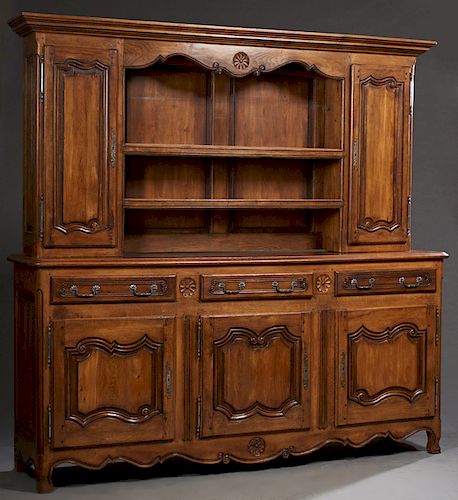 French Provincial Louis XV Stle Carved Cherry Buffet a Deux Corps, 20th c., the stepped crown over two central setback plate racks flanked by fielded 