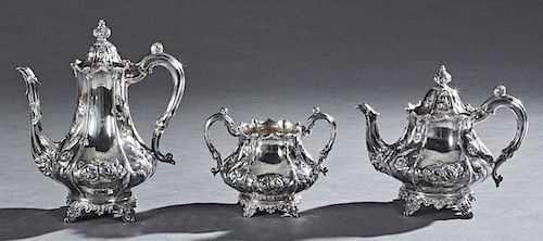 Three Piece English Sterling Coffee Set, London, 1843, by Robert Harper, consisting of a teapot, coffee pot and open sugar, with floral repousse decor
